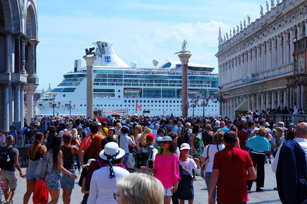 A big cruise ship is passing, front of St. Marco square, Venice