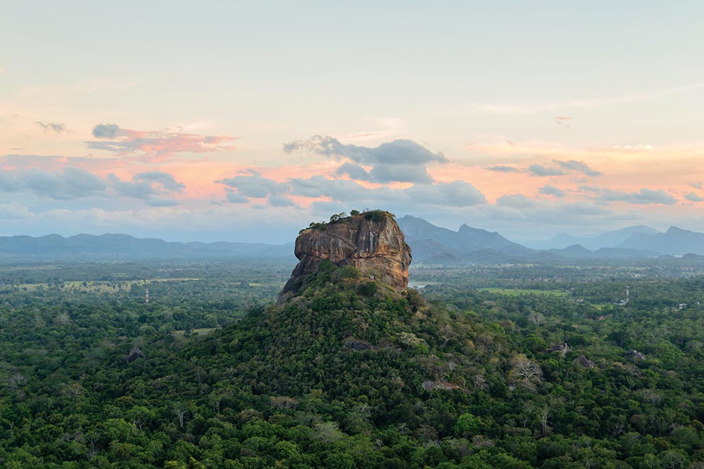 The historical Sigiriya rock fortress is surrounded by a breathtaking landscape