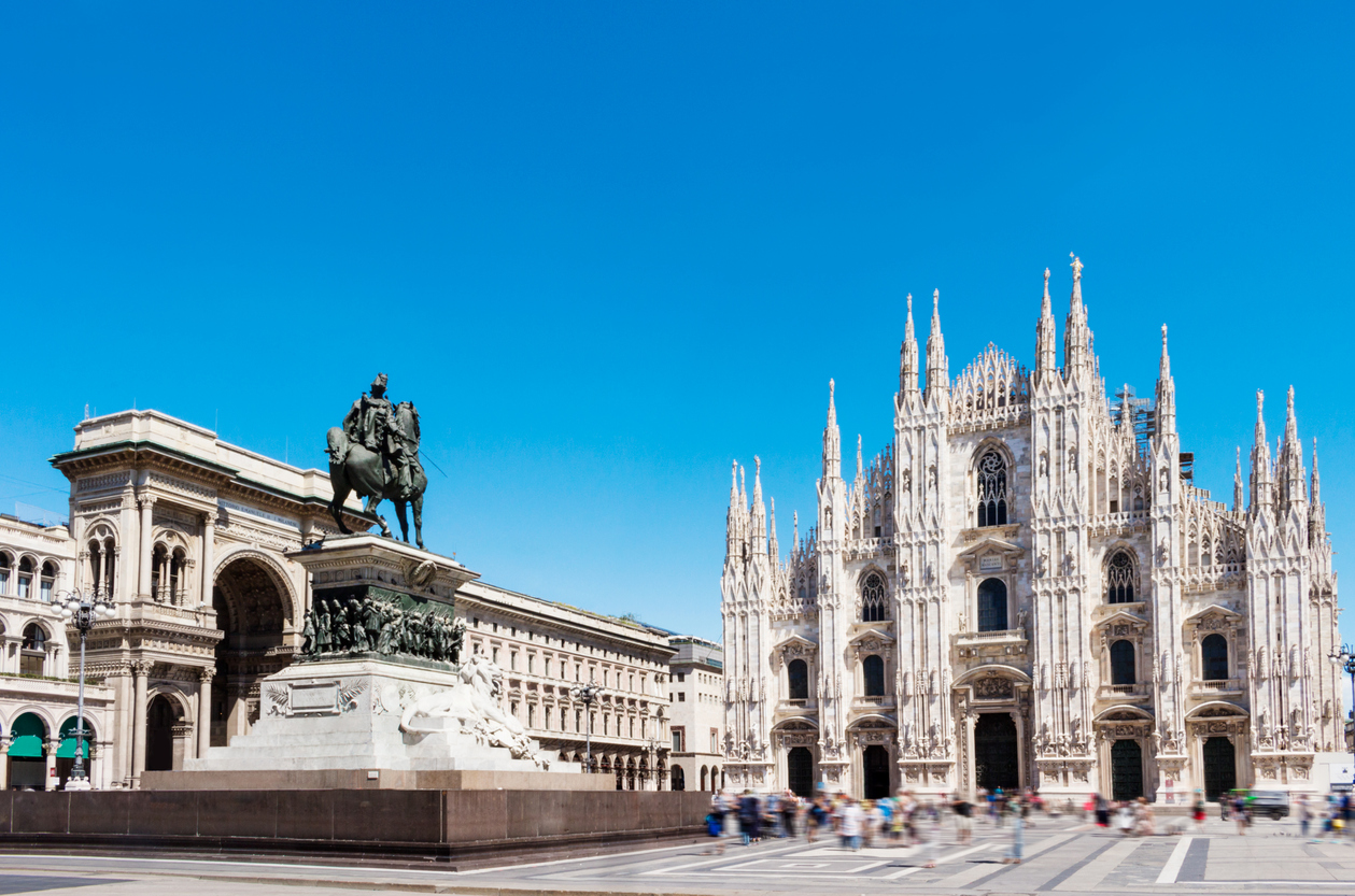 Duomo square with statue of Victor Emanuel 2nd. Milan, Italy.